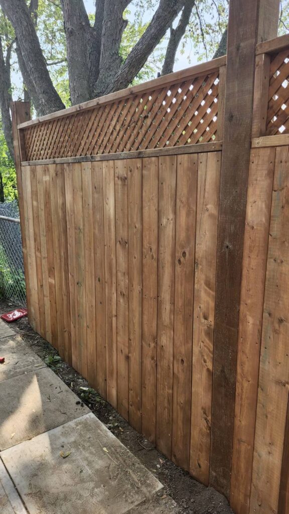 New cedar privacy fence with lattice top built by GNK Renovations